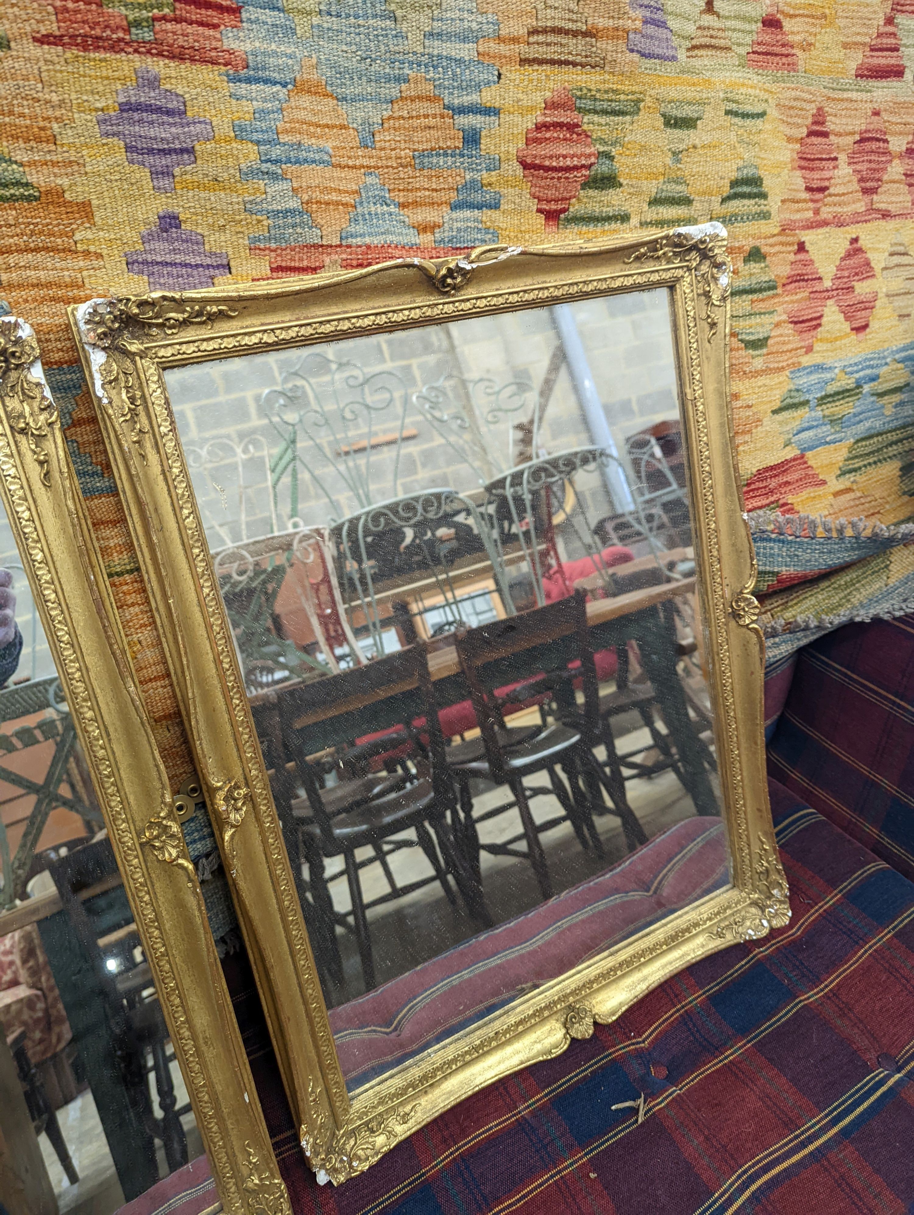 A pair of rectangular gilt gesso wall mirrors, width 48cm, height 64cm